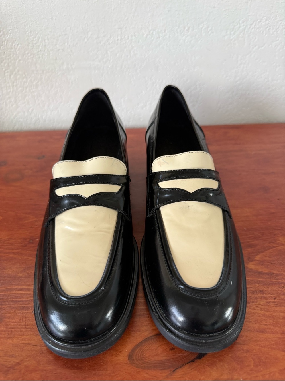 Classic Two-Tone Black and Cream Leather Loafers